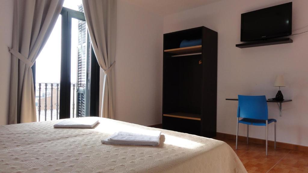 سانتا كولوما دي فارنرس Aparthotel Can Gallart الغرفة الصورة